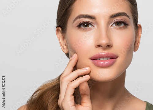Beauty woman face healthy skin beautiful eyes close up 