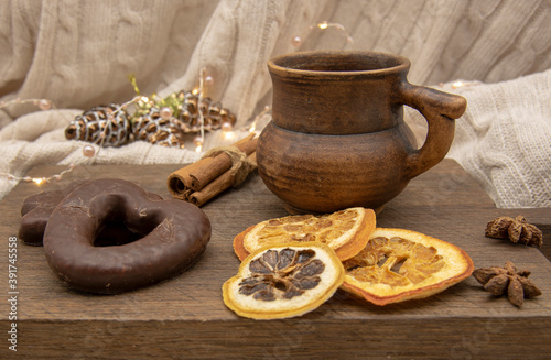 Wallpaper Mural A brown ceramic mug, sweets and aromatic spices stand on a wooden tray . Torontodigital.ca