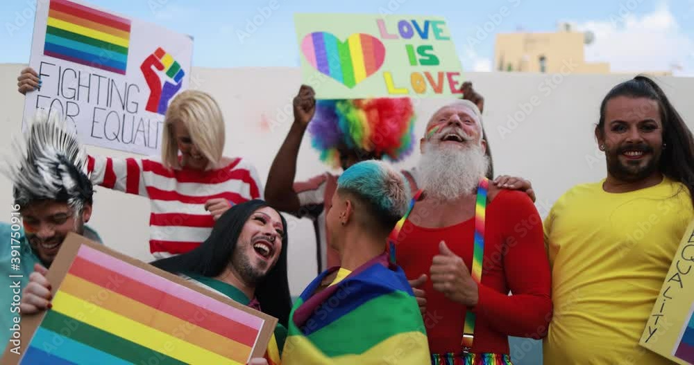 Gay people dance with banners and rainbow flags at pride party outdoor - Lgbt concept vídeo do Stock | Adobe Stock