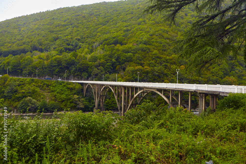 The mountain river along the Road, of a scenic highway by the beautiful Landscape covered in clouds and fog, bridge and viaduct, The mountain river along the road, The mountain river along the Road, of a scenic highway by the beautiful Landscape covered in clouds and fog, bridge and viaduct, The mountain river along the road,