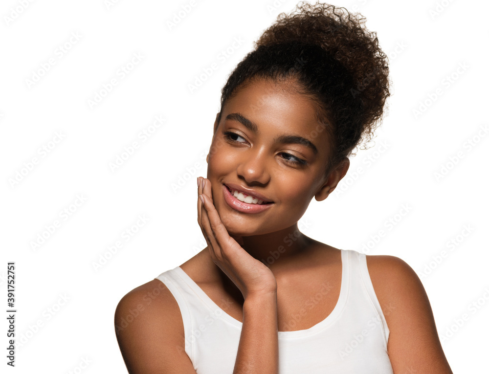 Beauty portrait of african american woman with clean healthy skin. Smiling beautiful black girl hair in afro style Beauty portrait of african american woman with clean healthy skin. Smiling beautiful black girl hair in afro style
