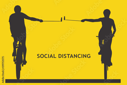 Sporty man and woman using monopodes to maintain physical distance while cycling, measuring safe quarantine distance with modern accessories photo