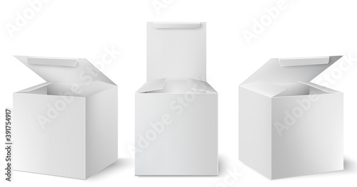 Set of three white boxes with opened lids positioned at different angles. Rea...