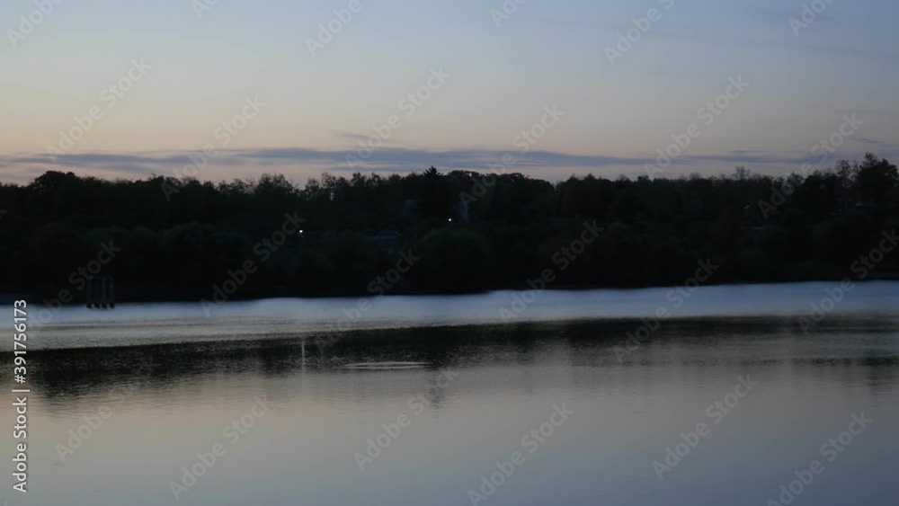 Beautiful autumn landscape of nature. River or lake in autumn. Evenings view. Shot in 4K Beautiful autumn landscape of nature. River or lake in autumn. Evenings view. Shot in 4K