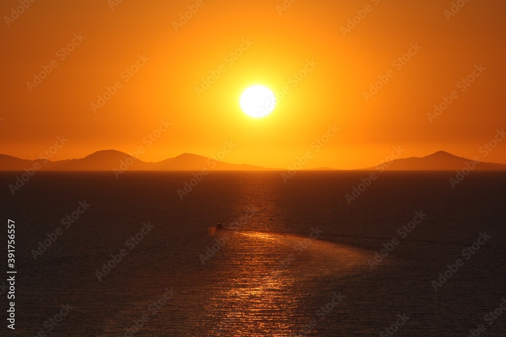 Fototapeta premium Sunset with Ship at Castelsardo, Sardinia