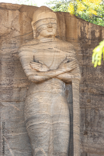 Polonnaruwa Sri Lanka Ancient ruins Statues of Buddha standing laying sitting photo