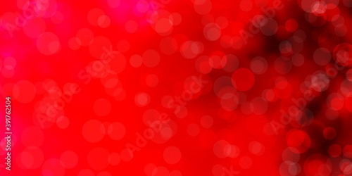 Light Pink vector texture with circles.
