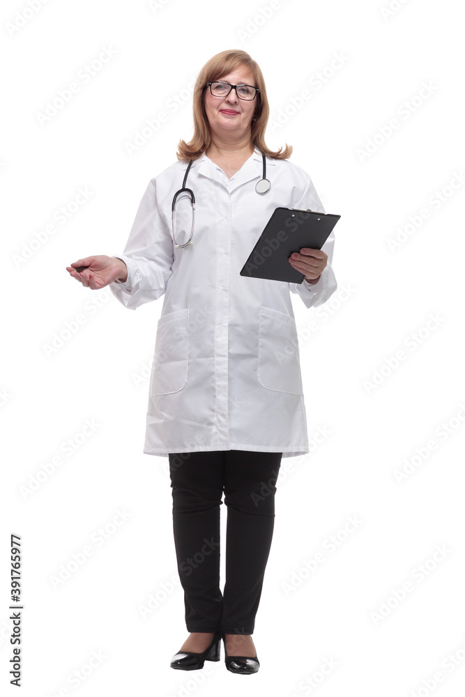 qualified female doctor making notes in the clipboard. qualified female doctor making notes in the clipboard.