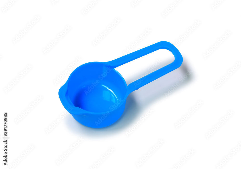 Blue measuring cup isolated on white background. Blue measuring cup isolated on white background.
