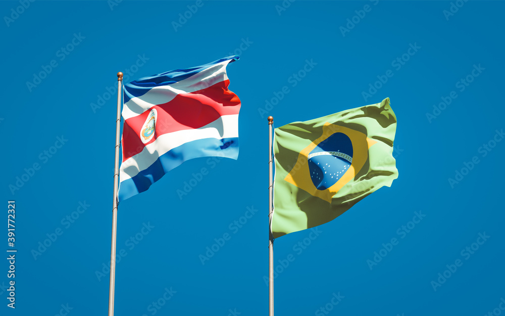 Naklejka premium Beautiful national state flags of Brasil and Costa Rica.