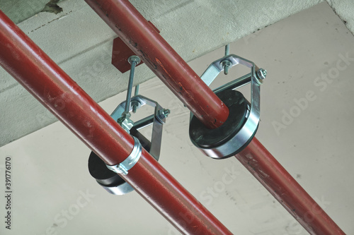 Installation of chilled water pipes and hanging with clevis hanger support photo