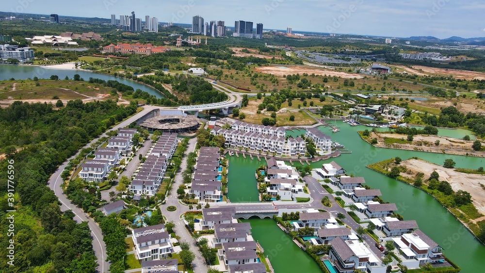Emerald Bay residences on man-made island, aerial photography with bungalow houses and villas near Iskandar Puteri of Puteri Harbour