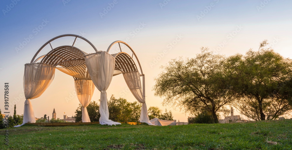 Chuppah a traditional wedding canopy under which a Jewish couple