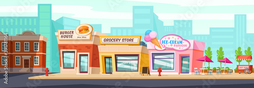 City street with shops, cafes and restaurants.Urban landscape