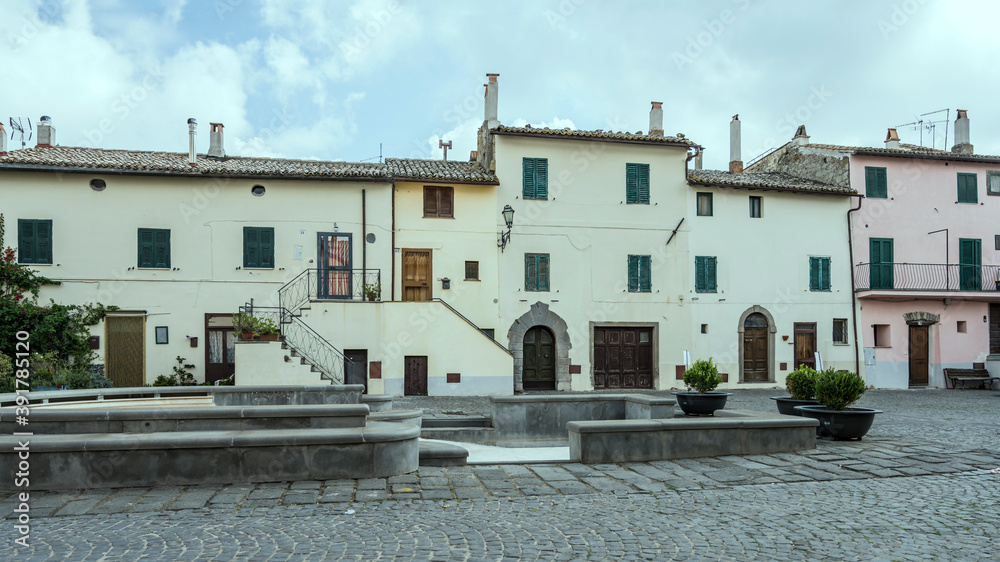 old houses on historical village square, Capodimonte, Italy