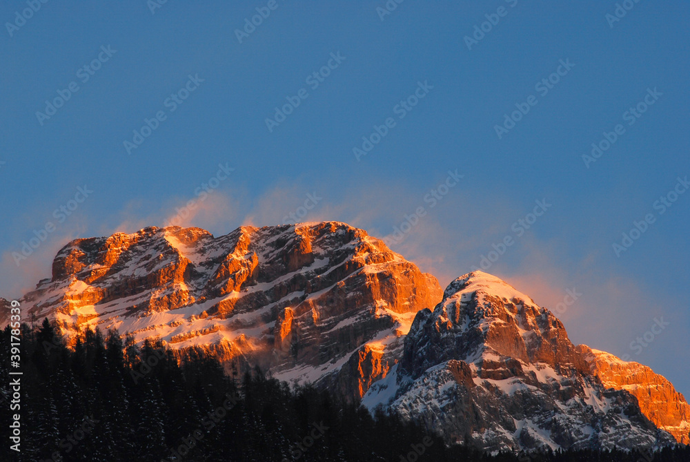 Sunset on the peak of Dolomites