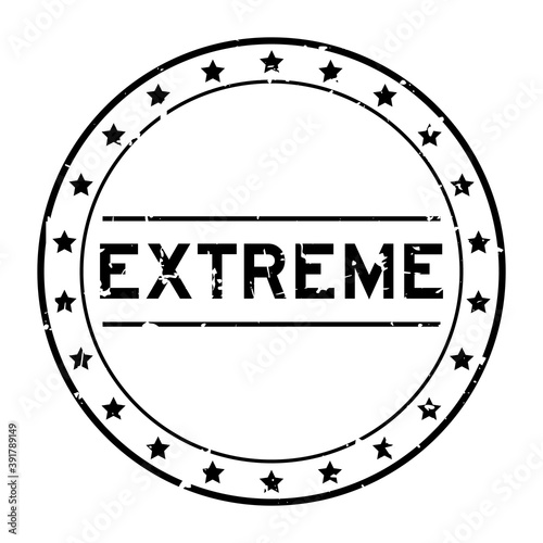 Grunge black extreme word round rubber seal stamp on white background