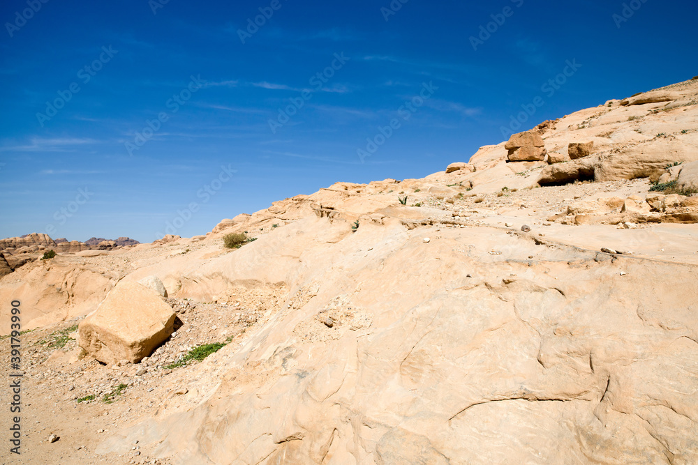 Mountain landscape around Djinn Blocks - stone tower tombs in Petra, Jordan Mountain landscape around Djinn Blocks - stone tower tombs in Petra, Jordan