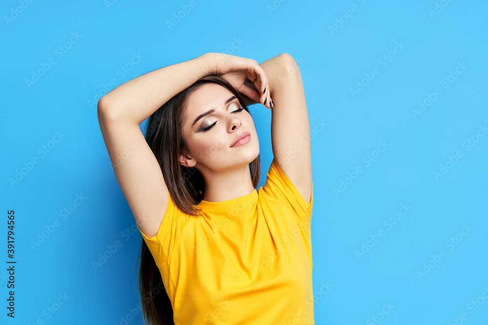 Sensual pretty woman portrait on blue background Sensual pretty woman portrait on blue background