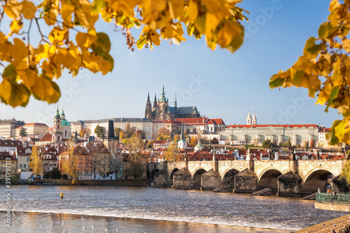 Photography Prague Castle with famous Charles bridge in Prague during autumn season, Czech R