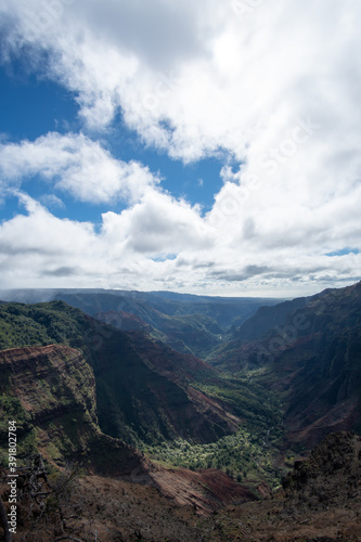 Waimea Canyon State Park, located on the oldest Hawaiian island of Kaua'i, is known as the "Grand Canyon of the Pacific". The canyon is famous for its reddish soil complementing its green foliage. 