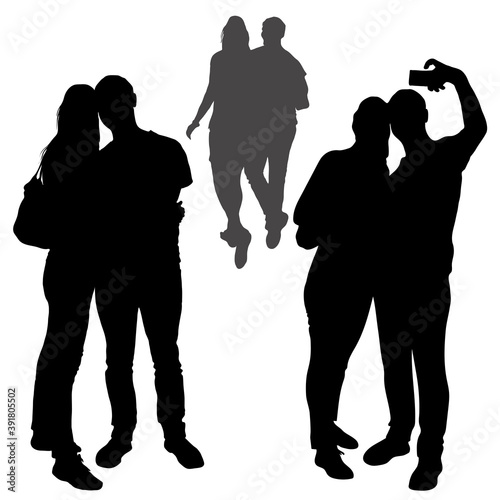 Vector silhouettes of a family couple a guy and a girl make selfies. A loving couple is embracing. Figures of woman and man receding into the distance, isolated white background stand in full growth.