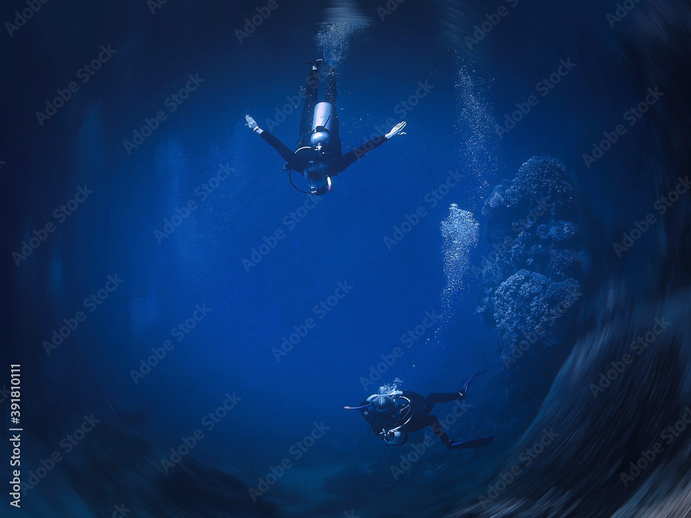 Underwater photo of scuba diver dance and love couple. From a scuba dive in the Red sea in Egypt. Underwater photo of scuba diver dance and love couple. From a scuba dive in the Red sea in Egypt.