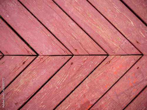 Картината върху платно Red colored cracky wooden floor laid deck