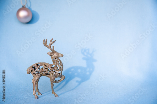 Christmas decorations on a blue background in the style of minimalism