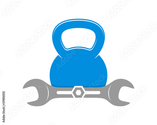 Fitness kettle bell with wrench underneath