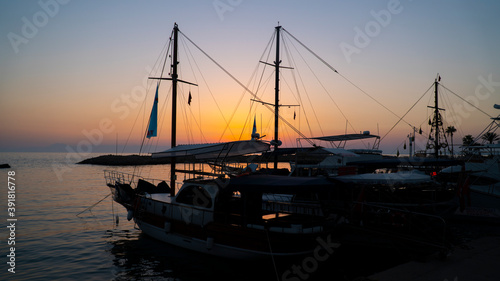Tourist boats in the marina at sunset © barkn