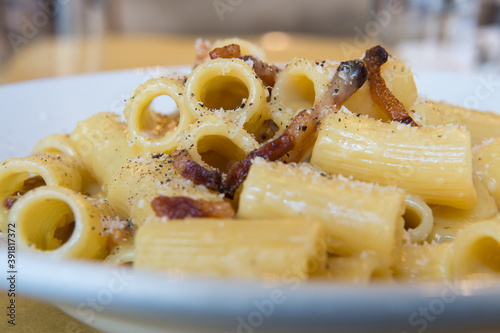 Rigatoni alla carbonara is a specialty dish from lazio region and Roma sorround photo