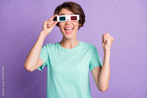 Photo of lovely lucky young lady wear casual teal outfit arm 3d film eyewear isolated purple color background