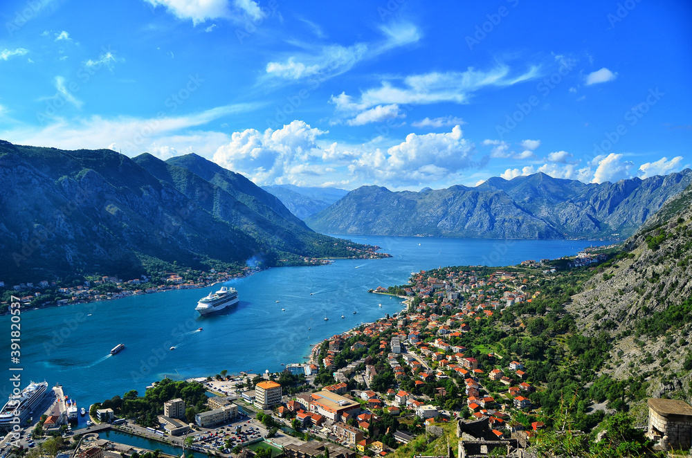 Summer Montenegro. Beautiful Kotor bay panorama view with cruise ship. Travel Europe Mediterranean blue sea 