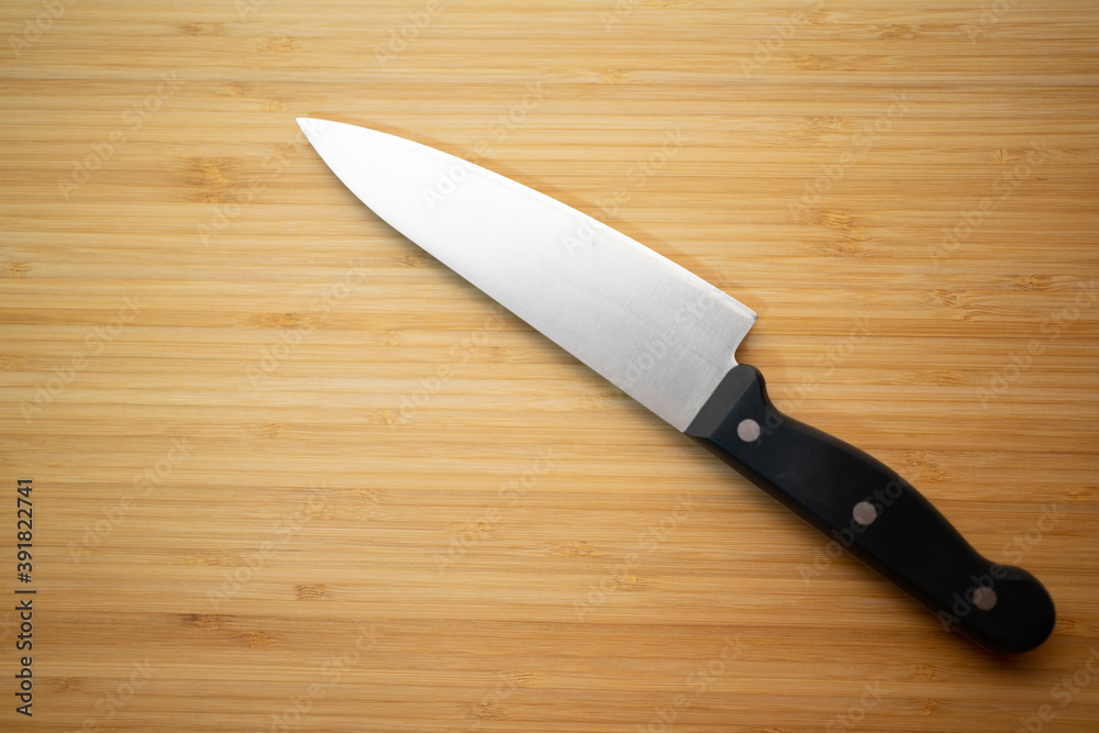 Knife on the background of the cutting board Knife on the background of the cutting board