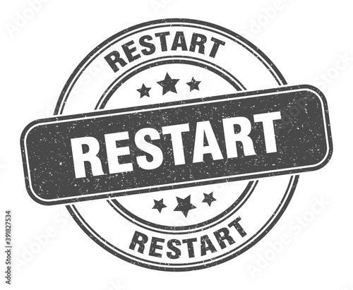 restart stamp. restart label. round grunge sign