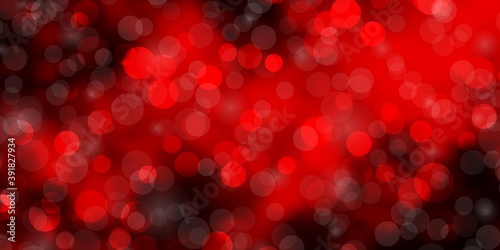 Dark Red vector background with circles.