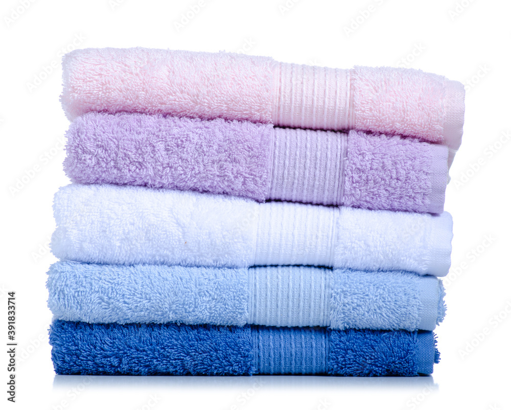 Stack folded towels on white background isolation Stack folded towels on white background isolation