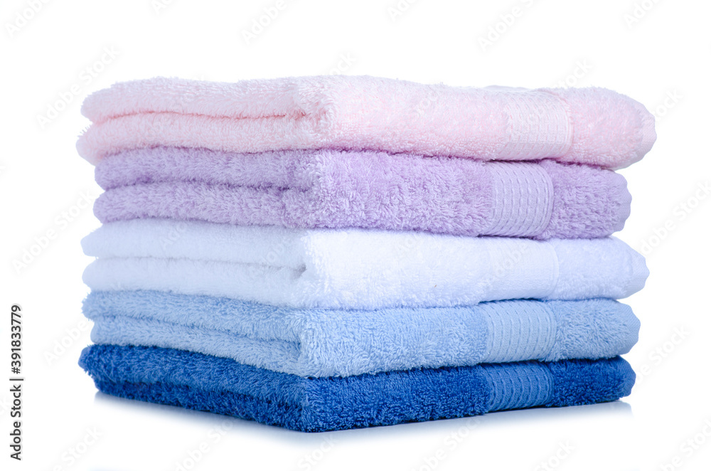 Stack folded towels on white background isolation Stack folded towels on white background isolation