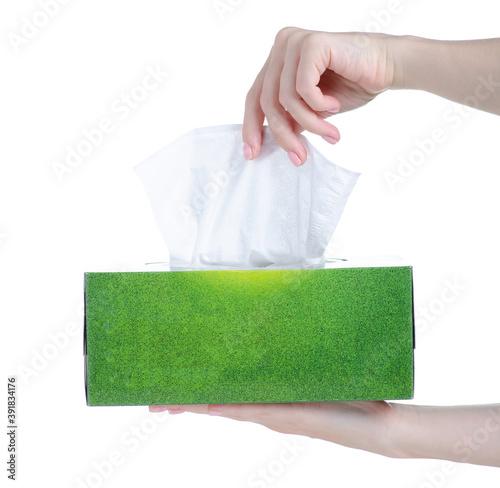 Foto Box with napkins wipes in hand on white background isolation