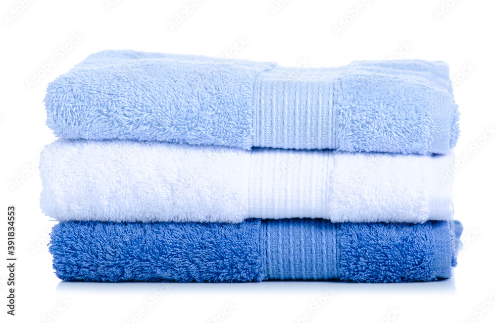 Stack folded towels on white background isolation Stack folded towels on white background isolation