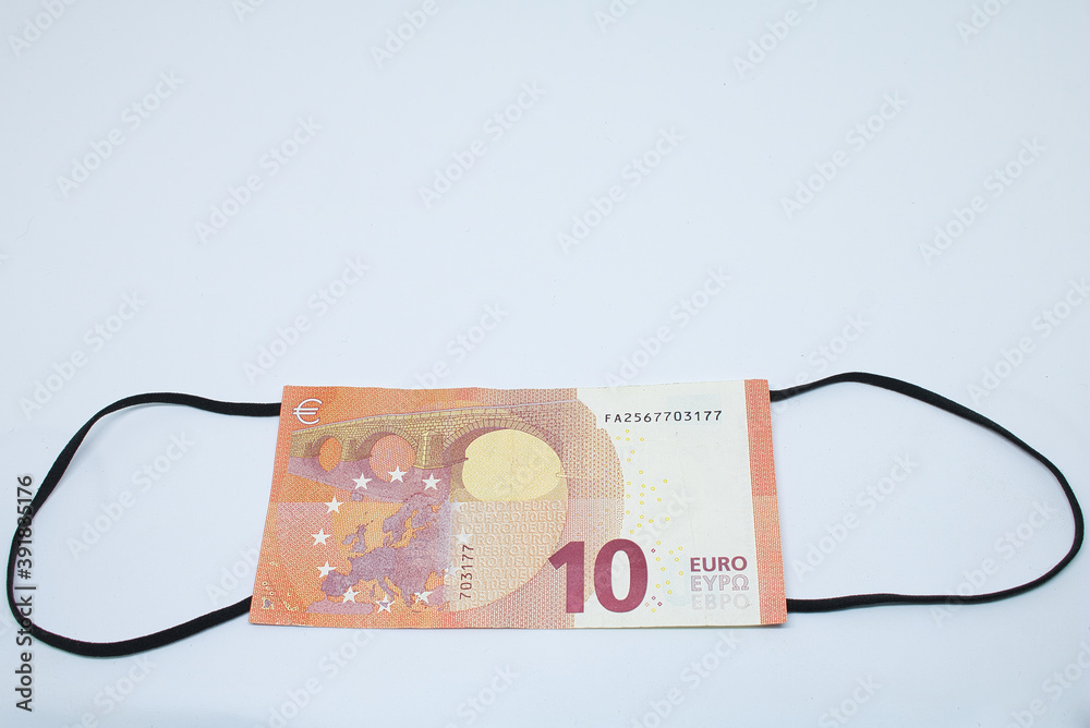 Coronavirus Face mask Euro banknotes with white background and Covid 19 money