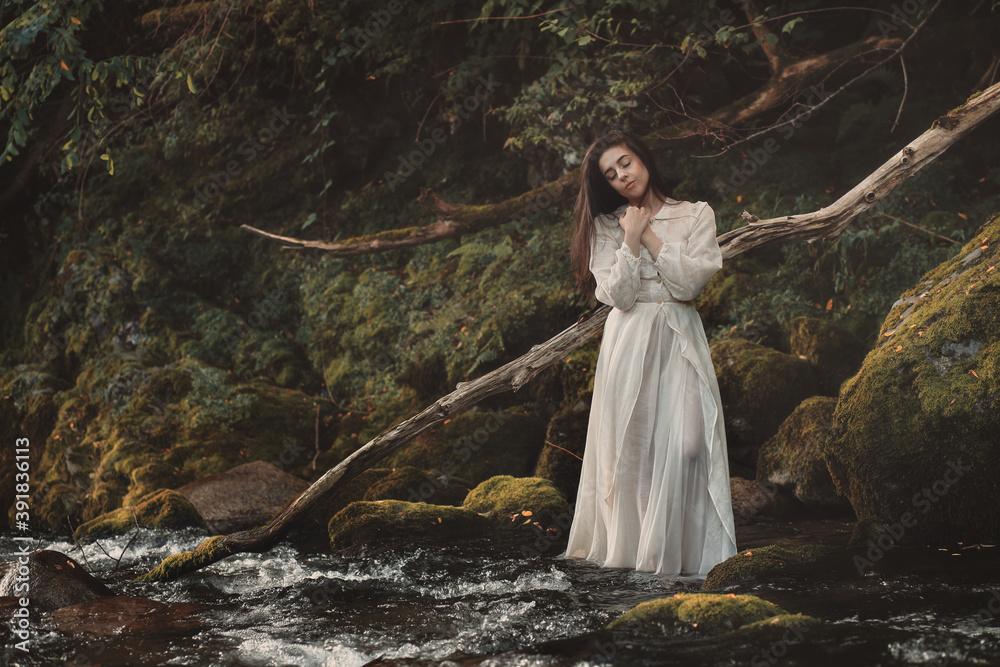 Beautiful woman in fairy fantasy forest Beautiful woman in fairy fantasy forest
