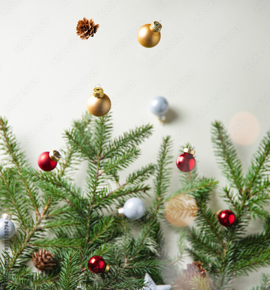 Christmas yellow background with fir branches, cones and Christmas toys. Christmas yellow background with fir branches, cones and Christmas toys.