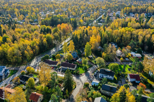 Aerial view of suburban area and autumn coloured nature in Espoo, Finland