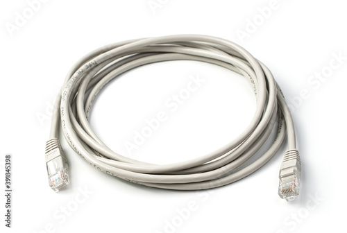 Network cable of the router. Patch cord. Side view, on a white background. Concept of Internet equipment.