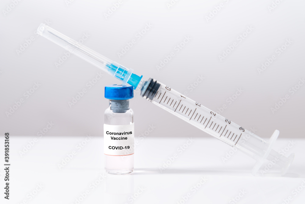 Coronavirus Vaccine. Corona virus Vaccine concept with Vial and Syringe on white background. Coronavirus Vaccine. Corona virus Vaccine concept with Vial and Syringe on white background.