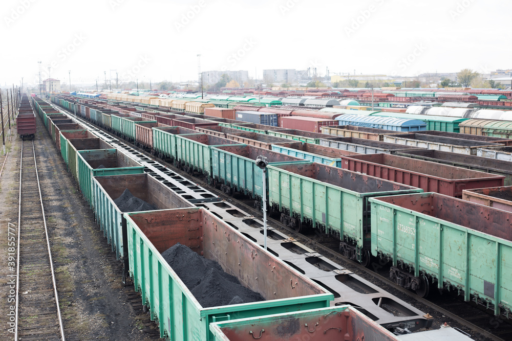 Export shipment.
View from the bridge to freight trains. Top view of old rusty wagons on the railway. Heavy industry. Railroad station. Transport Export shipment.
View from the bridge to freight trains. Top view of old rusty wagons on the railway. Heavy industry. Railroad station. Transport