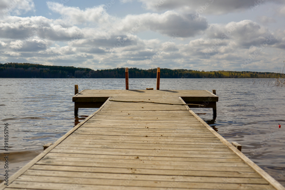 Wooden dock near the waterside, Lake Saimaa.