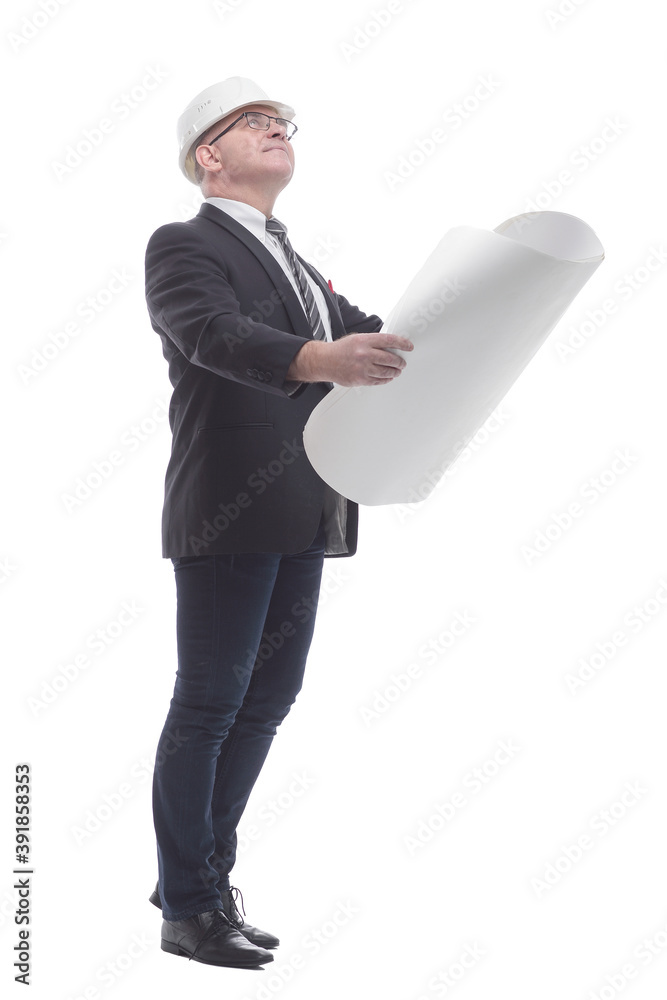side view. smiling architect reading a new drawing. side view. smiling architect reading a new drawing.